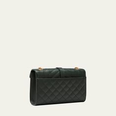 Saint Laurent shoulder bag in quilted powder-grain lambskin leather. Convertible shoulder strap that can be worn as a crossbody bag or doubled for a shoulder bag, 55cm drop Sliding leather/chain shoulder strap, 14.4" drop. Envelope top with metal YSL monogram; snap closure. Exterior, on flat open pocket at back. Golden hardware Interior, one main compartment and one flat pocket. Textile lining. Bag weighs approx. 1.8 lb./ 0.8 kg. Approx. 6.3"H x 9"W x 2.4"D. Comes with dust bag. Made in Italy. Quilted Double Flap Shoulder Bag For Business, Luxury Quilted Double Flap Bag, Chic Quilted Double Flap Shoulder Bag, Quilted Double Flap Shoulder Bag For Travel, Luxury Quilted Flap Bag For Business, Quilted Double Flap Shoulder Bag For Evening, Evening Quilted Double Flap Shoulder Bag, Quilted Crossbody Shoulder Bag For Business, Ysl Shoulder Bag