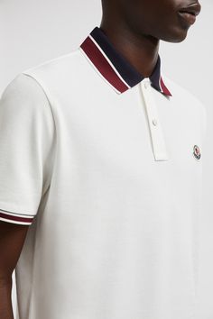 A wardrobe staple, this cotton piquet polo shirt is a timeless design. The classic collared style is finished with a striped trim. Sporty Polo Collar T-shirt With Moisture-wicking, Luxury Casual Polo Collar T-shirt, Luxury White Polo Collar T-shirt, White Polo Collar T-shirt With Embroidered Logo, Classic Polo Collar T-shirt With Button Closure, Personalized Jacket, Polo Shirt White, Cardigan Shirt, Shell Jacket