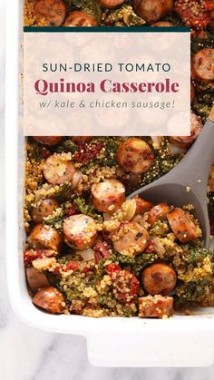 a casserole dish with sausage, spinach and quinoa in it