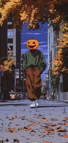 a person walking down the street with a pumpkin on their head