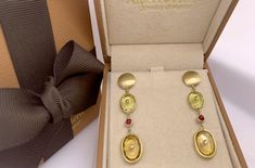 Earrings with 4 Oval Flatstones, 2 Lemon Citrines (9x11 mm) and 2 Citrine (13x10 mm) 14.40 carats total, and 2 Round Ruby Cabochon. Perfect gift for Christmas, Mom, Girlfriend, Daughter, Graduation, Birthday and more. Daughter Graduation, Christmas Mom, Gift For Christmas, Gold Watch, Citrine, Ruby, Lemon, Christmas Gifts, Perfect Gift