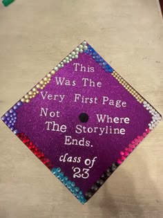 a purple graduation cap that says, this was the very first page not the storyline ends class of 1932