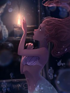 a woman with red hair holding a candle in her hand and blowing bubbles around her