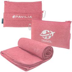 two towels, one pink and one red with the words travel printed on each towel