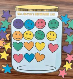 a jar filled with lots of different colored hearts and smiley faces on top of stars