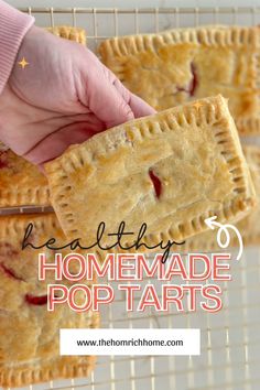 homemade pop tarts on a wire rack with text overlay that reads raspberry homemade pop tarts