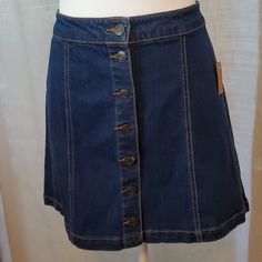 Denim Mini Skirt. Buttons All The Way Up. Brand New With Tags. Dark Wash Cotton Skirt With Button Zip Fly, Button-up Dark Wash Denim Skirt, Denim Skirt With Button Closure In Dark Wash, Dark Wash Button-up Denim Skirt, Dark Wash Denim Skirt With Button Zip Fly, Dark Wash Denim Skirt With Button Closure, Fitted Button-up Denim Skirt, Medium Wash Button-up Cotton Skirt, High Waist Dark Wash Skirt With Buttons