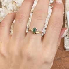 Estate/ vintage 14KT yellow gold ring with oval, genuine emerald + diamond accents. Stunning deep, green color on this emerald. Emerald is the birthstone for May babies + this ring makes a fantastic gift! Size 6.5 Weight: 2.10g Genuine, oval-cut, emerald measures: 6.5mm x 5mm .65~ .70 CT natirual diamonds (6) round diamonds; SI/I clarity; I color Stamped 585 (14K) Excelent estate condition Ballerina Ring, Deep Green Color, Saint Jewelry, Anniversary Wedding Band, Diamond Accent Ring, Yellow Gold Ring, Emerald Diamond, Deep Green, Fantastic Gifts