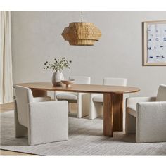 a dining room table with chairs around it