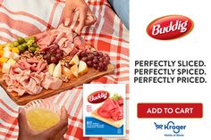 a person holding a tray of meat and fruit on top of a checkered table cloth