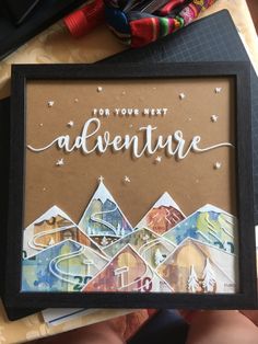 someone is holding up a paper cutout with the words for your next adventure