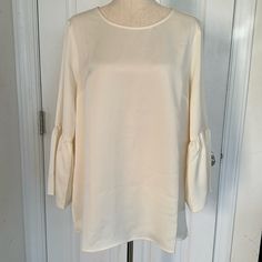 Beautiful Cream Color Blouse With Long Vents And Bell Sleeves. I Believe I Purchased From Qvc But Never Wore New It’s A Size M But I Listed As Xl Based On Measurements! It’s Oversized. Bust 23” Length 29” Vents 8” Washable Perfect Showcase For Beautiful Jewelry!!! Elegant Crew Neck Blouse For Brunch, Blouse With Bell Sleeves, Color Blouse, Tunic Length, Cream Color, Beautiful Jewelry, Bell Sleeves, Top Blouse, Womens Tops