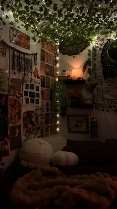 a bedroom with lots of lights and pictures on the wall