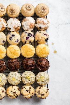 there are many different types of muffins on the rack