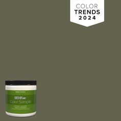 the behr color sample is shown in shades of green and white, with a black top