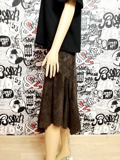 "womens skirt real Leather skirt womens midi skirt brown skirt Vintage brown Leather skirt suede Skirt Rock Skirt M height of the woman in the photo - 180 cm Please refer to photos for details of condition. Condition: very good vintage Measurements: Length: 73 cm/28.7 \" Waist 70 cm/27.6\" Hips: 86 cm/33.9\" tAG Size 8 EUR36 note The color on the pictures may vary due to monitor settings and light reflections. Ready to ship Please do not hesitate to contact with me for any questions. Thank you f Casual Brown Asymmetrical Skirt, Brown Pleated Skirt For Night Out, Brown Midi Skirt For Night Out, Brown Midi Skirt For A Night Out, Fall Fitted Suede Skirt, Fitted Suede Skirt For Fall, Brown Asymmetrical Mini Skirt For Fall, Brown Flowy Lined Mini Skirt, Flowy Brown Lined Mini Skirt