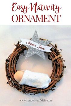 an easy nativity ornament with a baby's feet in a wreath