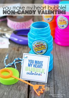 there are many items on the table for valentine's day to be filled with candy