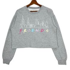 Friends 90s US Tv Series Cropped Short Crewneck Sweatshirt Jumper Grey Size Small * Made in : China * Size on Tag : Small (S) * Manual Measurement (inch) : Chest 21.5, Length 18, Shoulder 20.5, Sleeve 20.5, Hem 22. * Recommended for Size : Small (S) * Material : Cotton, Polyester, Spandex. * Colour : Grey * Condition : Excellent  * See photos for details. * Free Defect : No Stain, No Holes, No Tears, No Faded. 5321 90s Style Crew Neck Top For Fall, 90s Inspired Crew Neck Top For Fall, 90s Inspired Long Sleeve Letter Print Tops, 90s Inspired Long Sleeve Graphic Print Tops, 90s Inspired Long Sleeve Graphic Top, 90s Inspired Long Sleeve Top With Letter Print, Friends 90s, Womens Sweatshirts, Grey Sweatshirt