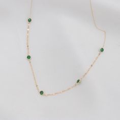 New from Studio Magnifique : Solid Gold Emerald Chain Necklace ✔Gold Karat: 14K Solid Gold(stamped) ✔Available Color: Gold, Rose Gold and White Gold ✔Length: Various Sizes Are Available ✔Gemstone: Simulated emerald ✔Approx. Weight: 1.40 grams ✔Beautiful design for you or for gift ✔All metals used in that necklace are 14K Solid Gold ✔Free Domestic Shipping ✔Each order will be packaged in a high quality jewelry box. Multiple orders will be sent in one package, please inform us if you need separate boxes. ✔Choose gift package in check out if it is a gift. Visit our store for other elegant options:  https://studiomagnifique.etsy.com Elegant Green Round Chain Necklace, Green Necklace With Adjustable Chain For Anniversary, Formal Green Necklace With Delicate Chain, Green 14k Gold Necklace With Adjustable Chain, Dainty Green Tarnish-resistant Necklace, Green 14k Gold Necklace, Tarnish Resistant, Green 14k Gold Necklace Tarnish Resistant, May Birthstone 14k Gold Clavicle Chain Necklace, Green Necklaces With Delicate Chain For Anniversary