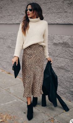 Cheetah Skirt Outfit Work, Autumn Outfits Skirt Midi, Leopard Midi Skirt Outfit Fall, Leopard Print Skirt Outfit Work, Slip Skirt Fall Outfit, Leopard Print Satin Skirt Outfit, Animal Print Skirt Outfit Winter, Satin Leopard Skirt Outfit, Autumn Evening Outfits