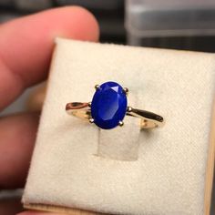 A simple 14kt gold solitaire set with an 8x6mm 1.38 carat Lapis Lazuli. The stone is natural and some variance is possible, such as darker coloring or higher amount of pyrite inclusions.  NOTE: ◊ This item is made to order, please allow 2-3 weeks for this ring to be handmade for you! Customizations and modifications are subject to longer production timelines and pricing. For rush orders, don't hesitate to get in contact with me and we can discuss options :) ◊ For international orders please leav Timeless Oval Cabochon Sapphire Ring Gift, 14k Gold Oval Cabochon Sapphire Ring For Gift, 14k Gold Sapphire Ring With Oval Cabochon For Gift, Minimalist Oval Sapphire Ring In 14k Gold, 14k Gold Solitaire Ring With Oval Cabochon, Lapis Lazuli Jewelry Ring, Lapis Lazuli Engagement Ring, Saphir Ring, Lapis Lazuli Jewelry