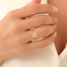 Step into a world of elegance and sophistication with our exquisite 14K Solid Gold Yellow Topaz Ring, an alluring piece that beautifully captures the essence of luxury. This stunning ring features a round-shaped, vibrant yellow topaz at its center, meticulously surrounded by real diamonds that add a touch of sparkle and sophistication. The combination of solid gold and luminous gemstones creates a timeless appearance ideal for any elegant event or casual outing. Yellow topaz, known for its uniqu Yellow Topaz Ring, Topas Ring, Yellow Sapphire Ring, Radiant Ring, Elegant Rings, Topaz Jewelry, Topaz Necklace, Topaz Ring, Real Diamonds