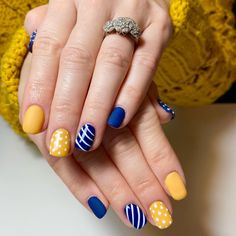 Dive into a world of stunning blue nail designs! From serene pastels to vibrant cobalts, discover 52 unique styles for every occasion. Elevate your look with these creative nail art ideas. Click the article link for more photos and inspiration like this // Photo Credit: Instagram @kimdavisbeautytherapy // #acrylicnails #bestnailstyles #bluemanicure #bluenail #bluenailideas #bluenailpolish #bluenails #darkbluenails Blue And Yellow Nail Ideas, Blue Nail Art Ideas, Blue Diamond Nails, Football Nail Designs, Marilyn Nails, Neon Blue Nails, Bright Blue Nails, Neon Yellow Nails