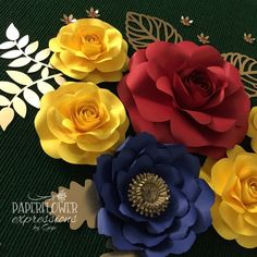 paper flowers are arranged on a table