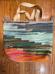 "This stylish multipurpose bag was designed to be a beach bag. It is created from woven recycled fabrics. It has a canvas liner with divided pocket.  It is 14\"X19\"X6\".  It can hold up to 3 2-liter bottles. Shipping included." Casual Travel Shoulder Bag Made Of Recycled Materials, Beach Fabric Tote Shoulder Bag, Summer Travel Canvas Bag, Multicolor Fabric Bags For Vacation, Multicolor Fabric Vacation Bags, Everyday Multicolor Bag Made Of Recycled Materials, Casual Multicolor Canvas Bag For Beach Season, Multicolor Casual Canvas Travel Bag, Casual Multicolor Canvas Travel Bag