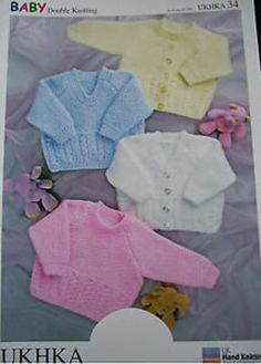 the knitting pattern for baby sweaters is shown