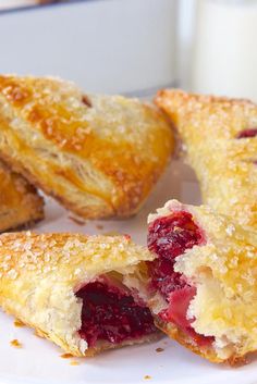 cranberry filled pastries cut in half on a white plate