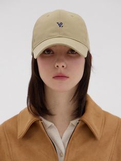 VARZAR is a total fashion brand that pursues pure reinterpretation and various attempts rather than trying to combine with certain cultures through various total fashions.- VZ Minimal embroidery point- Basic design ball cap made of 100% cotton- Great to wear all year around- Size adjustable with the back strap Trendy Beige Baseball Cap With Curved Brim, Trendy Beige Baseball Cap With Curved Visor, Khaki Visor Baseball Cap For Spring, Trendy Beige Cotton Dad Hat, Spring Khaki Cotton Baseball Cap, Casual Beige Embroidered Logo Baseball Cap, Beige Embroidered Visor Hat, Casual Beige Baseball Cap With Embroidered Logo, Trendy Cream Cotton Baseball Cap