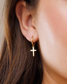 Meet our lovely cross hoops! Classic and minimal, perfect for any occasion and for your everyday wear since they are so dainty and timeless. Stack it with our other hoops and studs to create your own personal and unique look!  DETAILS * Material : 18K Gold on Brass / Sterling Silver. * Special anti-tarnish protective coating. * Handcrafted with love in our studio. * Comfortable and lightweight.  * Hoop Inner Diameter : 9mm * Cross Size : 10mm * Sold in pairs.   PACKAGING & GIFTS We will package your order in a beautiful gift box :) * You can also gift the jewelry straight to your loved one!  * If you are purchasing multiple items, we will package them together in the same box.  * If you need separate boxes, please leave us a note at checkout. Thank you for visiting our shop! If you have qu Minimalist Cross Pendant Earrings, Cross-shaped Huggie Earrings For Gift, Minimalist Hypoallergenic Cross Earrings, Dangle Cross Earrings, Packaging Gifts, Earrings Cross, Necklace Clasps, Gold Filled Earrings, Cross Bracelet