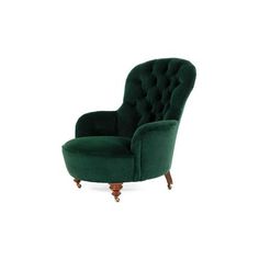 an upholstered green velvet chair with wooden legs and foot rests on a white background