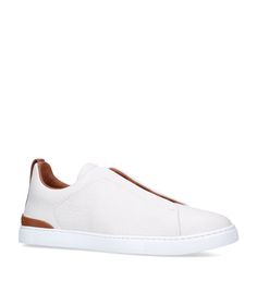 Modern Slip-on Sneakers In Calf Leather, Slip-on Low-top Sneakers With Stitched Sole, Leather Slip-on Sneakers With Abzorb Midsole And White Sole, Leather Slip-on Sneakers With White Sole And Abzorb Midsole, Modern Low-top Slip-on Sneakers With Leather Sole, Calf Leather Slip-on Sneakers With Perforated Toe Box, Luxury Slip-on Sneakers With Perforated Toe Box, Leather Slip-on Sneakers With Abzorb Midsole, Calf Leather Slip-on Sneakers With Stitched Sole