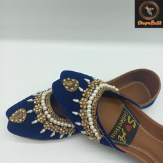 Elevate your style with these exquisite Handmade Women's Punjabi Jutti, a perfect blend of traditional craftsmanship and modern design. Crafted with precision and care, these Ladies Pakistani Indian Khusa Sandals feature intricate blue pearl detailing that adds a touch of elegance to any outfit. Whether you're attending a wedding or simply looking for a unique gift for her, these Blue Pearl Punjabi Scandals are sure to make a statement. Available in US UK sizes 6, 7, and 8, these shoes are not only fashionable but also comfortable to wear all day long. Treat yourself or a loved one to these beautiful Wedding Shoes that are a true reflection of artistry and culture. Handmade with love and attention to detail, these Punjabi Juttis are a must-have addition to any fashion-forward wardrobe. Vis Panjabi Juti, Blue Punjabi Jutti, Punjabi Jutti Wedding, Punjabi Jutti With Ghungroo, Jutti Punjabi, Pakistani Khussa, Beautiful Wedding Shoes, Punjabi Jutti, Womens Wedding Shoes