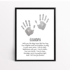 a black and white print with the words grandpa written on it in front of two handprints