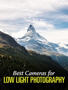 the words best cameras for low light photography are in front of a photo of a mountain