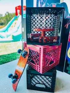 a skateboard sitting on top of two crates