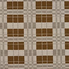 a brown and white checkered pattern on fabric