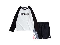 Hurley Kids Shark Teeth Swim Set (Toddler) - Boy's Swimwear Sets : Black : Stay in style with the Hurley Kids Shark Teeth Swim Set. Crew neckline with long sleeves. Graphic print on front. Two piece set includes: rash guard shorts. One and Only logo print. Supersuede fabric with mesh liner. 100% Polyester. Machine wash. Imported. If you're not fully satisfied with your purchase, you are welcome to return any unworn, unwashed items in the original packaging with tags and if applicable, the protective adhesive strip intact. Note: Briefs, swimsuits and bikini bottoms should be tried on over underwear, without removing the protective adhesive strip. Returns that fail to adhere to these guidelines may be rejected. Cheap Blue T-shirt For Playtime, Cheap Sporty T-shirt For Playtime, Boys Swimwear, Swimwear Sets, Swim Sets, Shark Teeth, Boy Clothes, Rash Guard, Two Piece Set