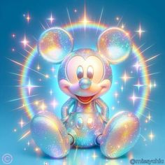 a mickey mouse sitting in front of a rainbow colored background