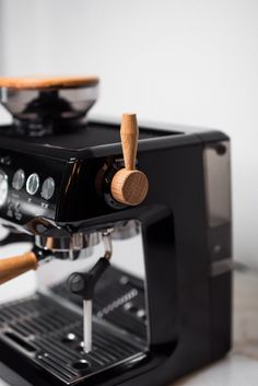 an espresso machine sitting on top of a counter