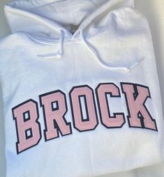 * customizable tackle twill text and colours  * unisex fit 50/50 cotton poly blend hoodie Hip Hop Hoodie With Letter Print For College, Hip Hop Letter Print Hoodie For College, Hip Hop Style College Hoodie With Letter Print, White Team Spirit Hoodie For Streetwear, College Team Spirit Hoodie With Letter Print, School Spirit Hoodie With Letter Print For Sports Events, White Fleece Hoodie With Letter Embroidery, Pink Hoodie With Letter Embroidery For Streetwear, Sporty College Hoodie With Lettering