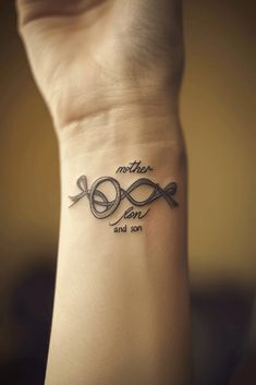 a woman's wrist tattoo with the words mother and son on it