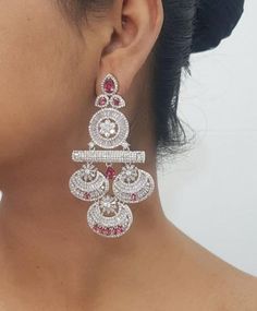 White Stone/Cubic Zirconia/Bollywood Jewelry/White Statement Earring/Indian Jewelry/Earring/Pakistani Jewelry/Punjabi Jewelry/Cubic Zirconia Very Elegant and stylish, suitable for any occasion and attire. Cubic Zirconia Chandbali Bridal Earrings With Stone Work, Traditional Cubic Zirconia Chandelier Earrings For Wedding, Traditional Cubic Zirconia Chandelier Earrings For Festive Season, Festive Cubic Zirconia Chandbalis With Stone Work, Festive Chandbalis With Cubic Zirconia Stone Work, Traditional Festive Chandelier Earrings With Cubic Zirconia, White American Diamond Chandbali Bridal Earrings, Festive Chandbalis With Stone Work And Cubic Zirconia, Fusion Style Party Chandbalis With Hand Set