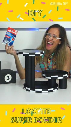 a woman sitting at a table with a book in her hand and the caption diy loctite super bonder