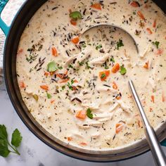 a large pot filled with soup on top of a table