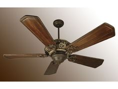 a ceiling fan with wooden blades and ornate carvings on it's bladed blades